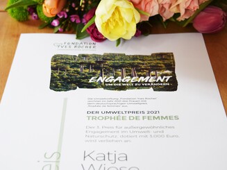 Urkunde der Auszeichnung "Tropheé de femmes" für die Geschäftsführerin Katja Wiese von Naturefund